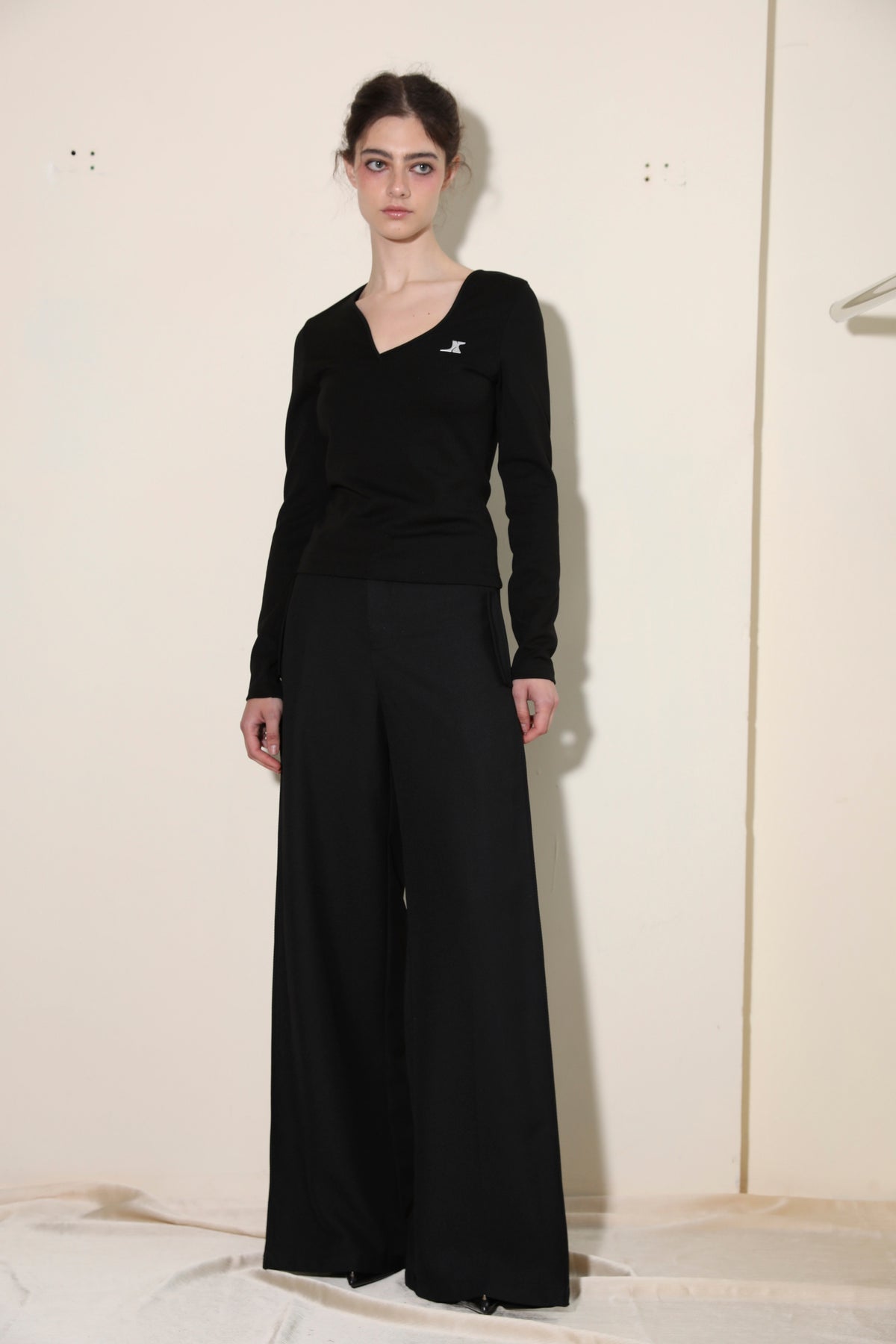 Necessary Ananke Black Pleated Trousers with Leather Belt.